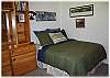 One of the bedrooms with a queen size bed