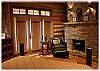 The master bedroom features a cozy fireplace