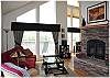 Cozy living room with fireplace and fantastic views out to the river