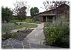 Wonderfully landscaped with paths and patios on each side of the home and by the creek