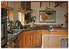 Another view of the open kitchen and dining room