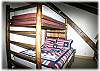 The "bunk room" with a twin bed over a double bed