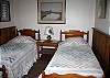 One of the guest bedrooms, with two twin beds.
