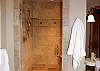 The walk-in shower in the master bath