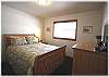 The third bedroom with queen size bed
