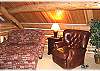 A loft area with TV, VCR and movies