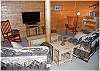 Roomy lower level famiy room with satellite TV, DVD player and many games!