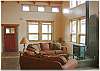 Cozy living room centered around the gas fireplace