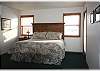 Cozy king size bed in the master bedroom
