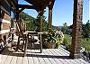 Relax on the front porch and enjoy the beauty of your surroundings.