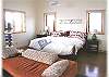 Wonderful master suite with king size bed, seating area with woodstove, and private bath