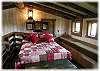 A double size bed in the loft area