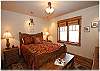 Guest bedroom with queen size bed.