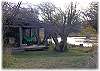 The "fishing hut" down by the river, complete with firepit, hammock and even an outhouse!