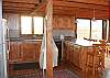 Another view of the fully equipped kitchen.