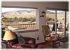 A cozy reading chair with views to the river