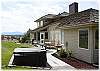 Beautiful yard with a deck and hot tub to sit back and enjoy the views