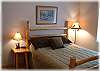 The upstairs bedroom with a queen bed