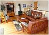 Living room with gas stove and a flat screen TV