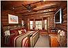 Master bedroom with king size bed and flat screen tv