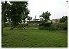 A lush yard down by the creek, for picnics, lawn games and enjoying the solitude