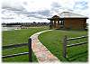 The gazebo with hot tub, sauna, and patio furniture is just a few steps from the house!