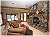 Downstair family room with fireplace, pool table and foosball table