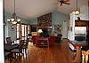 The dining area and kitchen are open to the living room