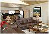 The living room is open to the dining area and kitchen