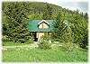 Guest cabin in a lush mountain setting