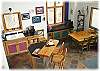 The bright and cheery kitchen with bar seating for two