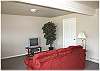 The lower level den area with pullout sofa and tv - accessed via private entrance