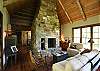 Beautiful rock fireplace in the living room and dining room