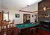 Billiards and game room with a pool table and gas fireplace
