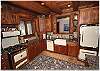 The kitchen features modern appliances