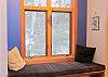 Window seating provides a nice spot to read