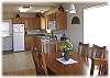 The dining area adjoins the kitchen
