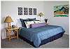 The master bedroom with king size bed