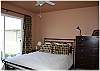 Master bedroom with queen size bed and private bath