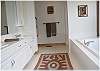 Master bath with a tub and seperate shower