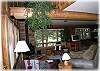 The cozy living room with a gas fired "woodstove"