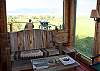 Relax and read in the sun room just off the kitchen.