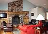 A nice living area features a large fireplace