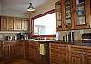 Fully equipped kitchen with views up the mountain