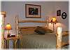 Cozy bedroom with queen size log bed
