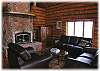 Living room with leather sofas and a gorgeous fireplace