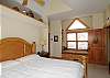 The master bedroom with a king bed