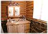 Full bathroom with tub and shower in the guest cabin