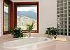 Master bath with a deep tub