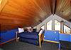 A trundle bed also in the loft